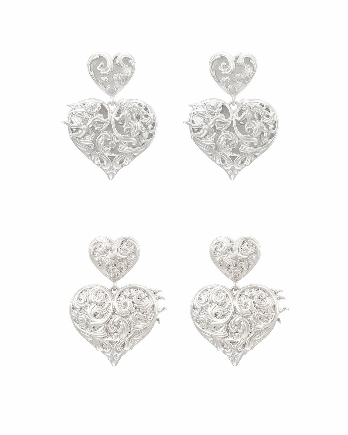 Four silver heart-shaped earrings with intricate filigree scrollwork and a smaller matching heart stud above each larger heart, displayed on a clean white background.
